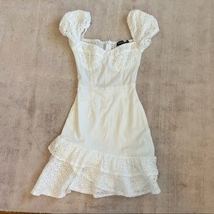 White dress with floral detail